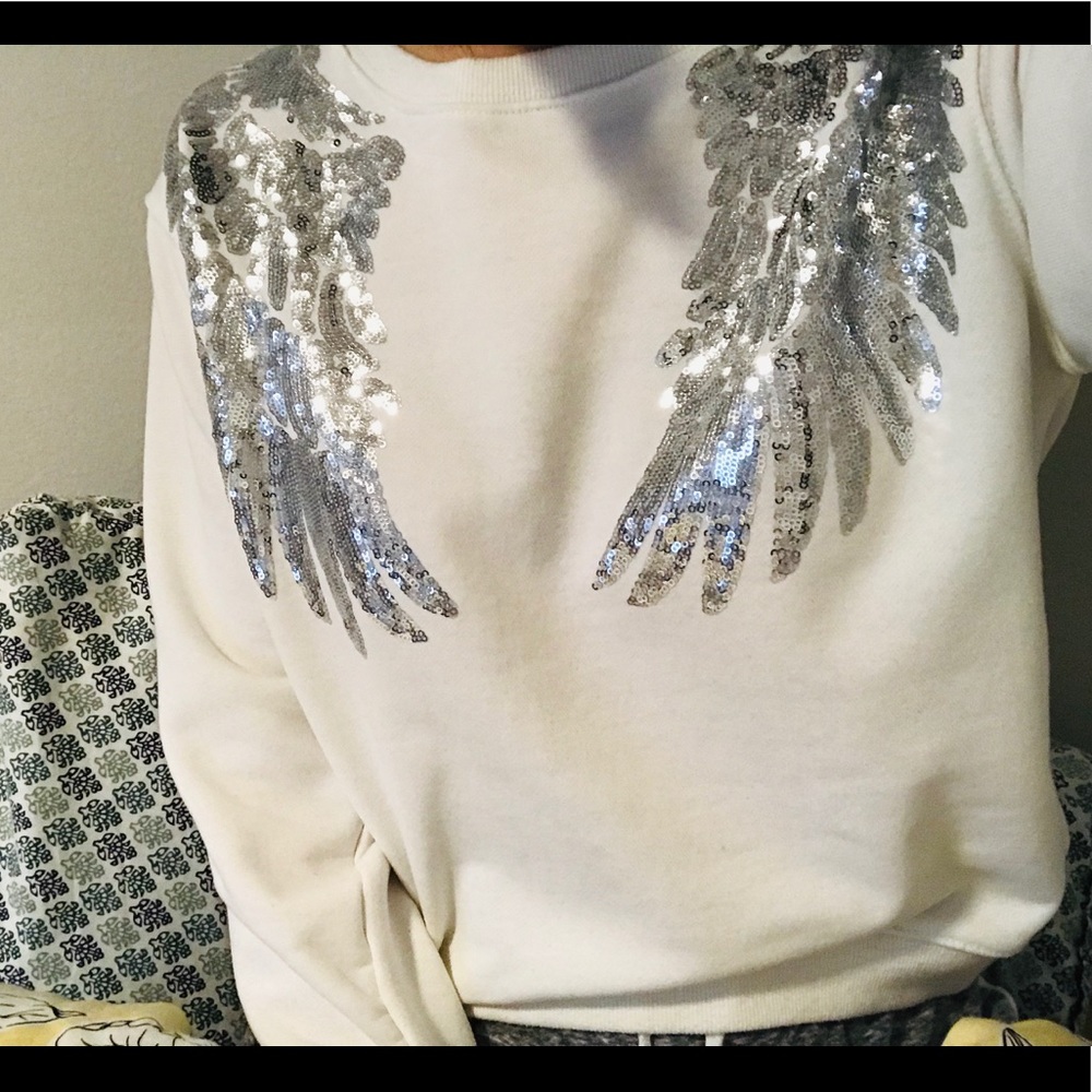White shirt with wings